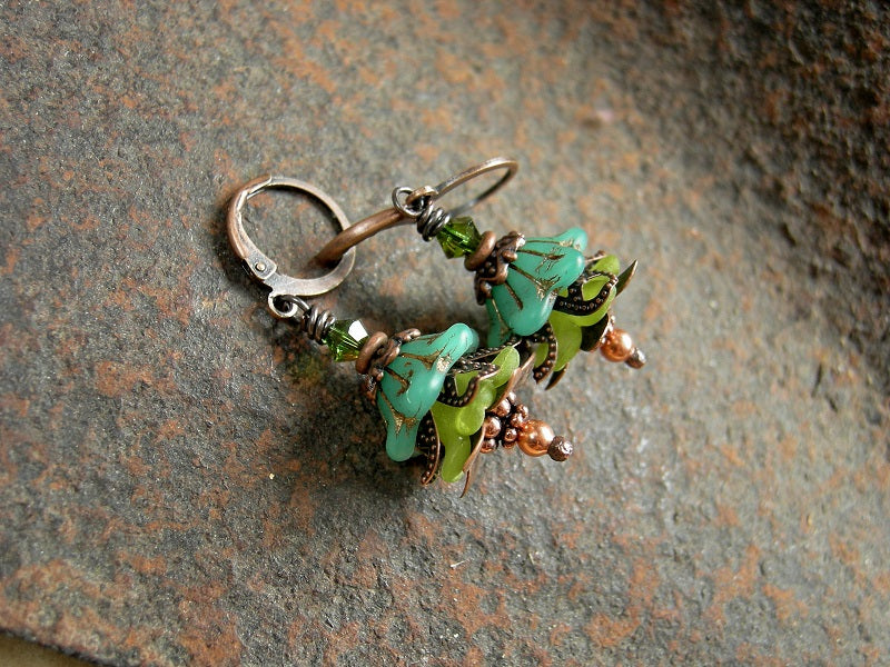 Tiny flower earrings with gpper caps & beads and Swarovski crystals. reen glass & resin flowers, co