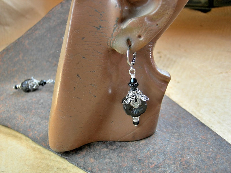 Bead stack earrings with black glass flowers, silver details & Swarovski crystal. 