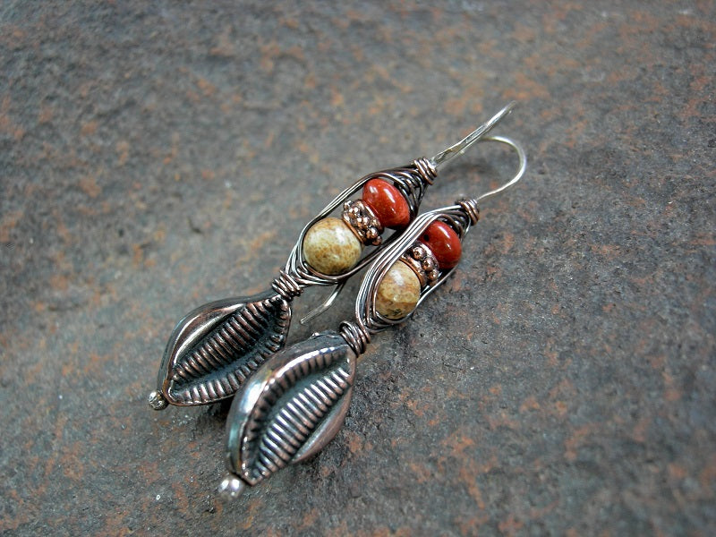 Wrapped hook style earrings, with hollow copper leaf beads, red & brown jasper. Sterling ear wires. 