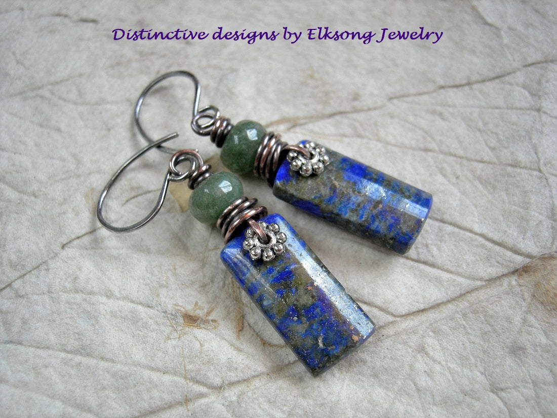 Blue lapis stone tab earrings with faceted green aventurine rondelles, silver daisy facers & oxidized copper wire wrap. 