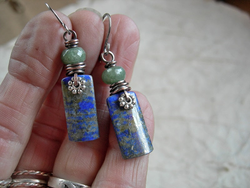 Earthy blue lapis stone tab earrings with faceted green aventurine rondelles, silver daisy facers & oxidized copper wire wrap. 