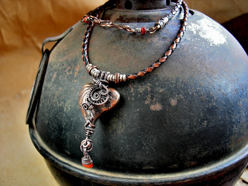 Leather bolo cord necklace with copper Thai style heart & copper wire wrap focal, red coral & spiny oyster shell beads. 