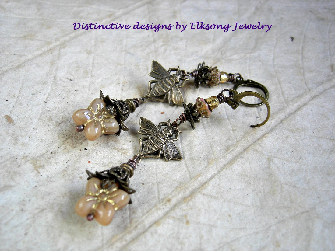 Mellow Gold earrings, late summer colors with bronze bee connectors, glass flowers & faceted beads & antiqued brass filigree caps. 