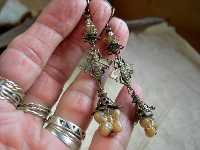 Summer gold bee & flower earrings with antiqued brass details & faceted glass beads. 