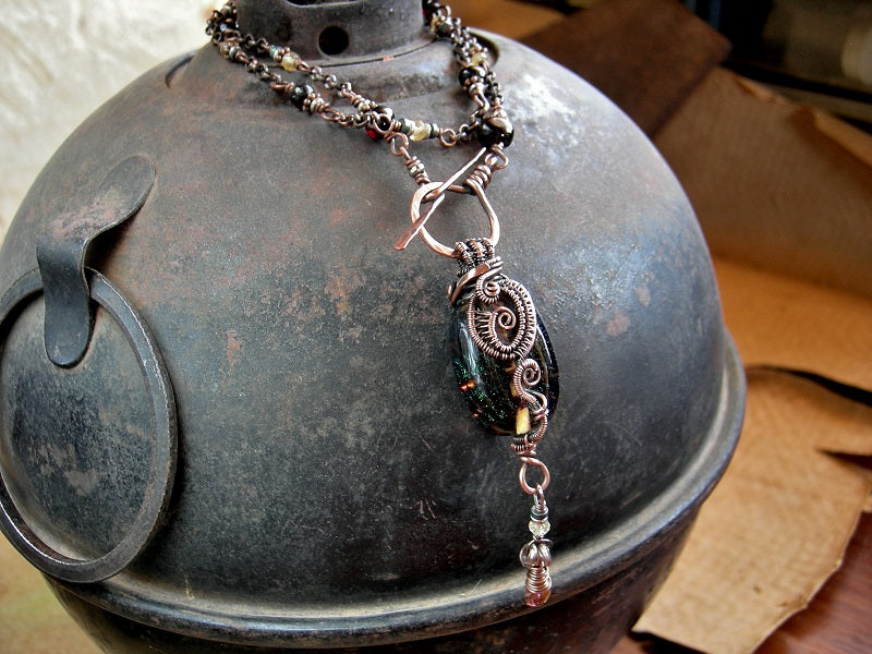 Handmade lampwork glass focal necklace, pale gold citrine & black amber. Copper wire wrap & front facing toggle clasp. 
