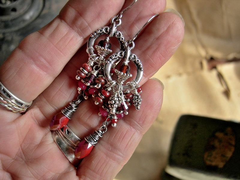 Crimson cluster style earrings with silver details and faceted garnet & crystal beads. 
