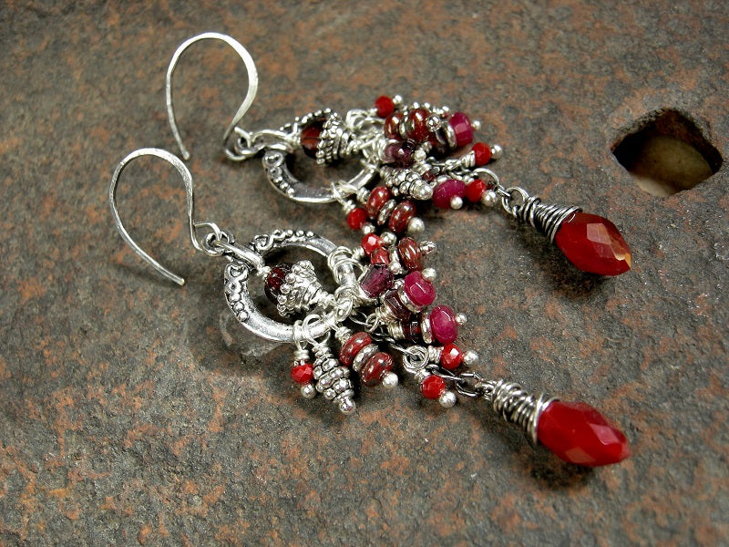 Bohemian cluster style earrings with silver details and faceted garnet & red crystal beads. 
