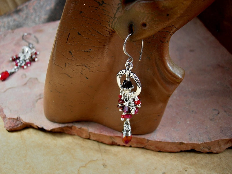 Crimson cluster style earrings with silver details and faceted garnet & crystal beads. 