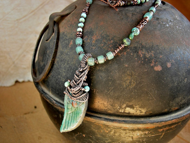 Aqua green ceramic wing necklace with copper wire wrap & asymmetrical turquoise, vintage Java glass & copper strung beads. 