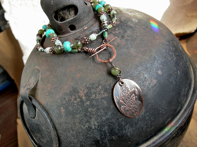 Earthy elegant necklace with etched copper dragonfly focal, handmade copper toggle clasp  & blue green gemstone beads.