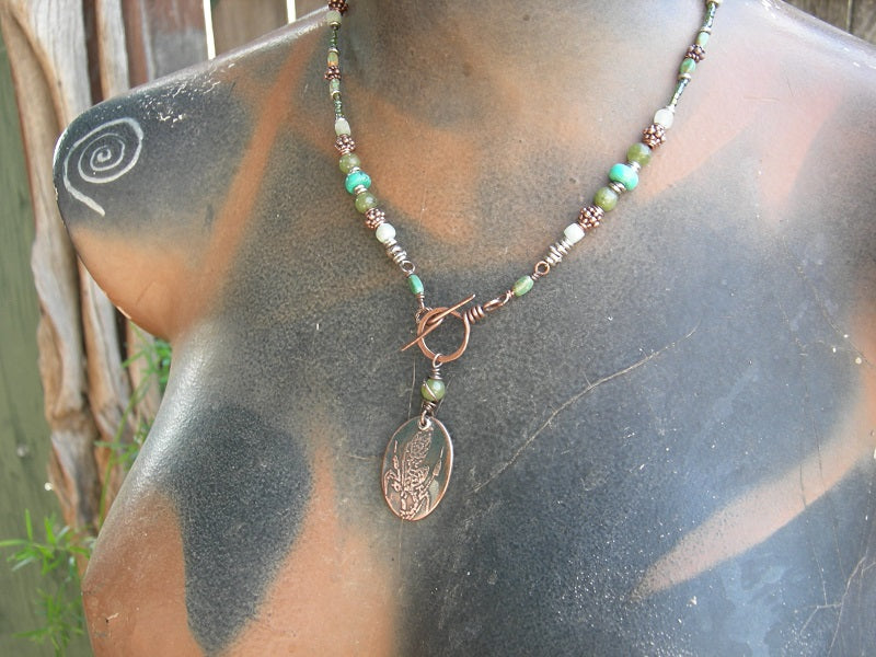 Water color necklace with etched copper dragonfly focal, blue green gemstone beads & handmade copper toggle clasp. 