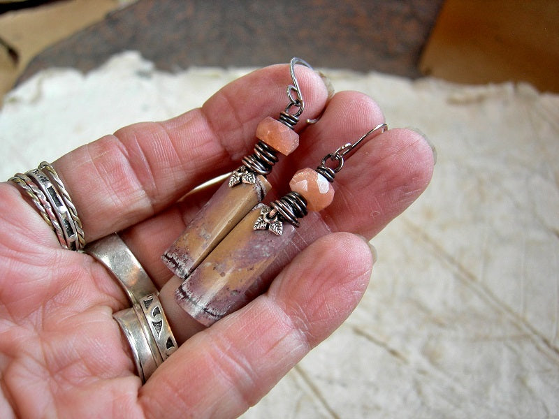 Boho earrings, hand cut Mexican rhyolite stone tabs in soft pink orange & brick, faceted sunstone & copper wire wrap.