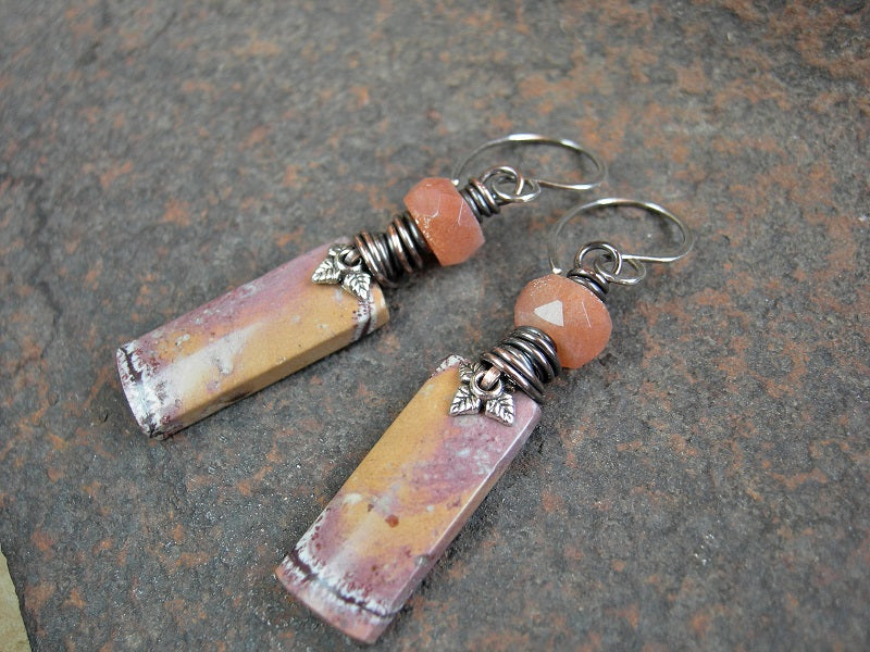 Eathy elegant stone tab earrings, with hand cut Mexican rhyolite in soft pink orange & brick, faceted sunstone & copper wire wrap.