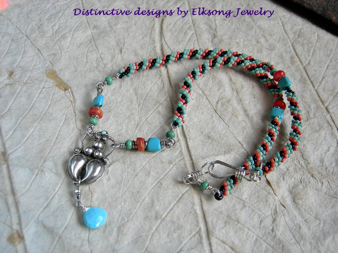 Delicate woven bead necklace in turquoise & coral colors. Gemstone beads, sterling goddess focal, faceted turquoise briolette. 