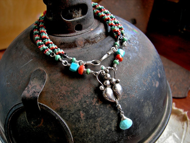 Delicate woven bead necklace in turquoise & coral colors. Gemstone beads, sterling goddess focal, faceted turquoise briolette. 