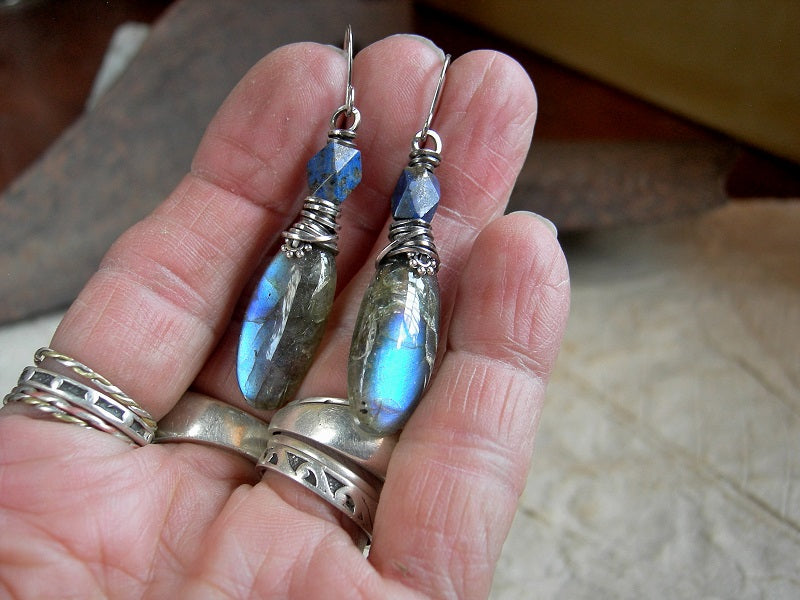 Stone tab earrings of glowing blue labradorite with faceted lapis & sterling wire wrap. 