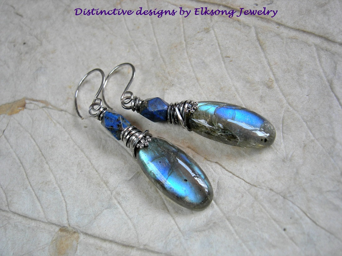 Luminous blue flash labradorite earrings with faceted lapis beads & oxidized sterling wire wrap. 