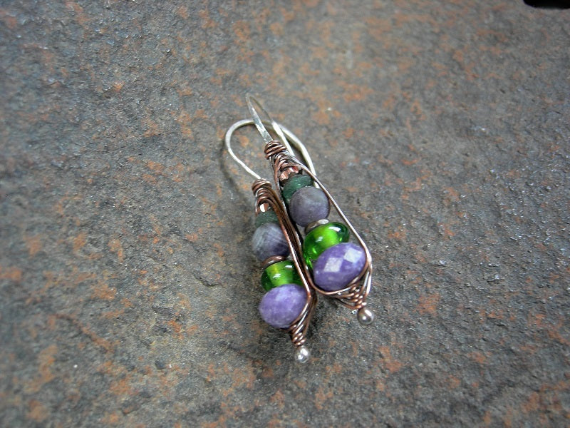Copper wire wrapped purple & green gemstone & glass wrapped hook earrings. Amethyst, Indonesian & ancient Roman glass. 