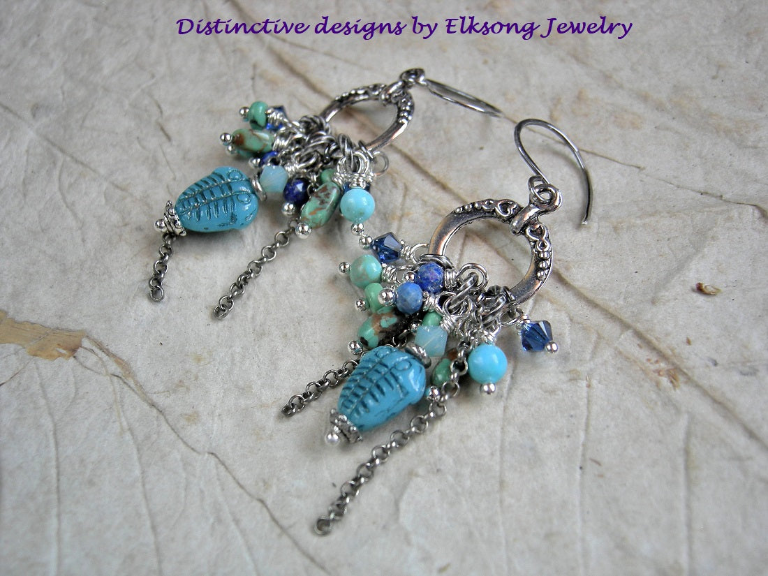 Deep Sea trilobite earrings, clusters of Swarovski crystal, faceted lapis, genuine turquoise & sterling chain falls. 